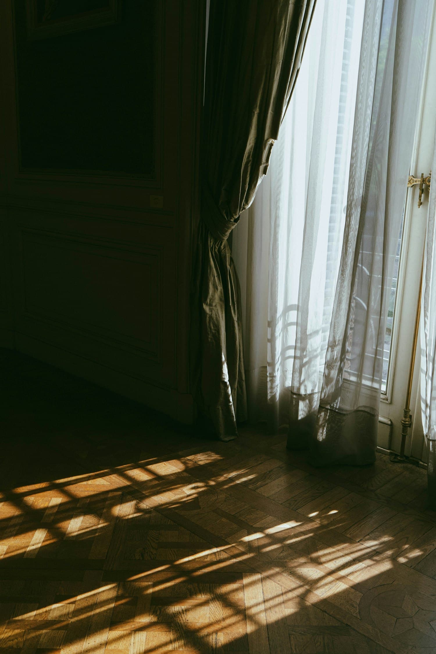 Warm afternoon light spilling across a quiet room